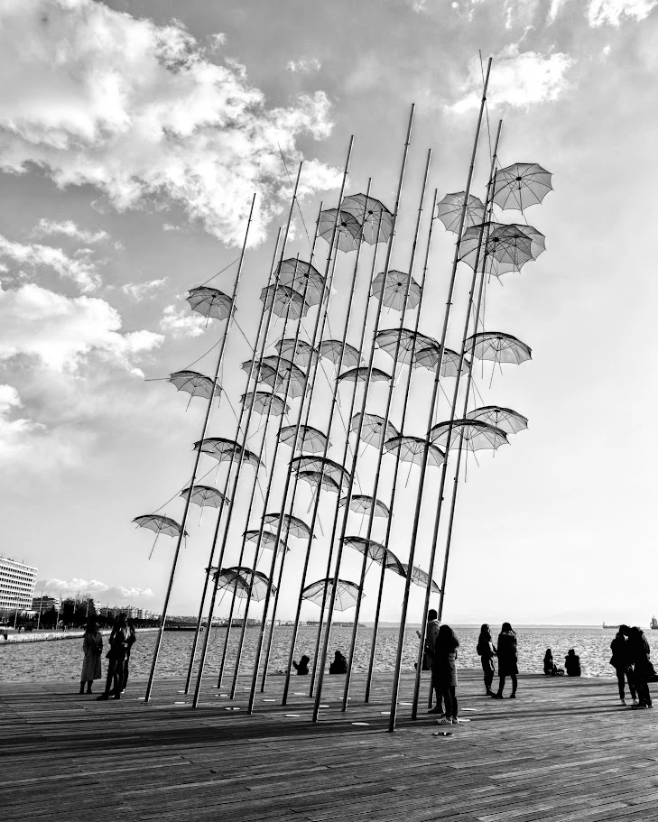 People around The Umbrellas in Thessaloniki, Greece